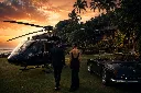Tropical sunset luxury with helicopter and car.webp
